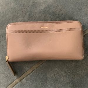 Tan leather fossil wallet with gold zipper